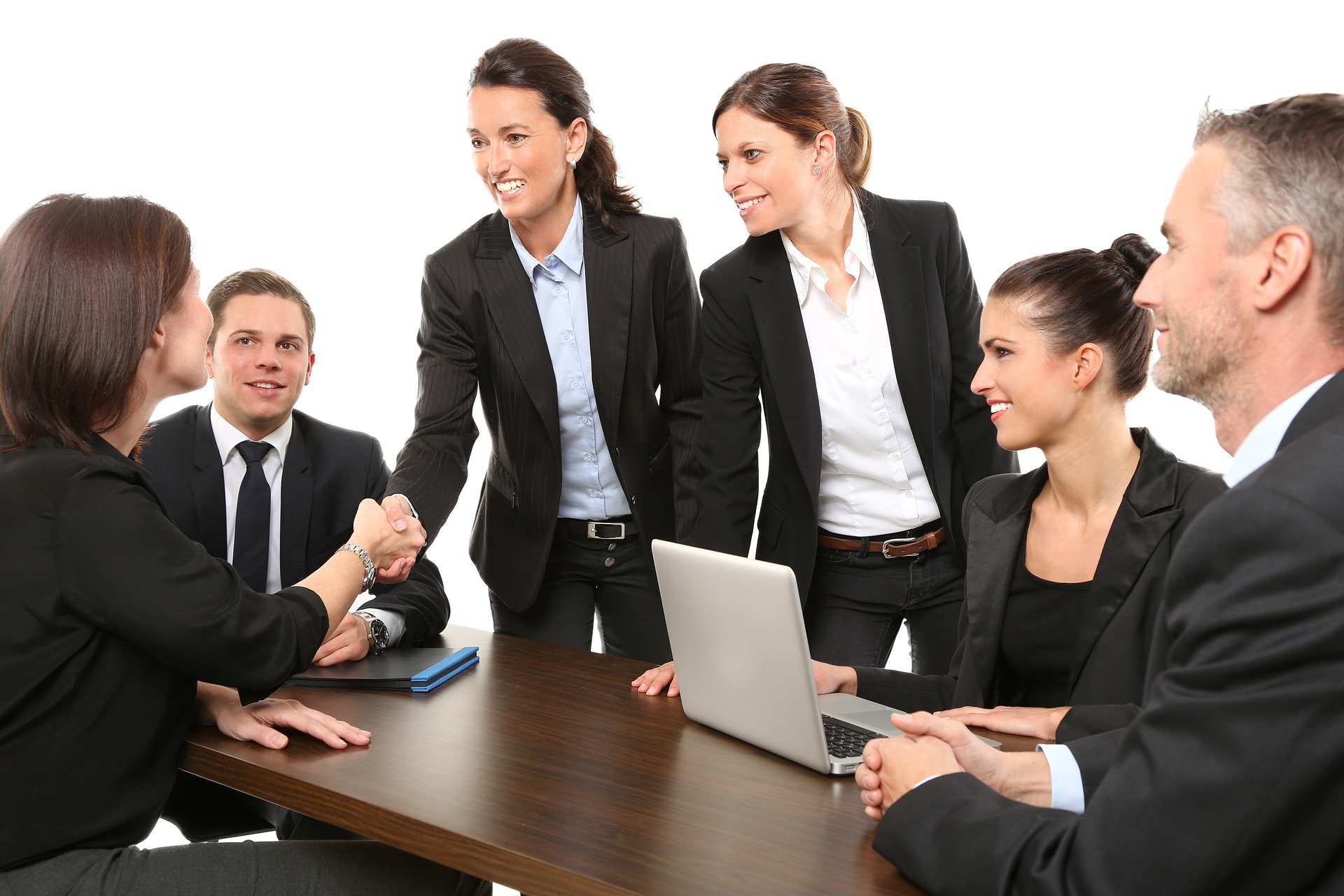 Professional men and women in a meeting